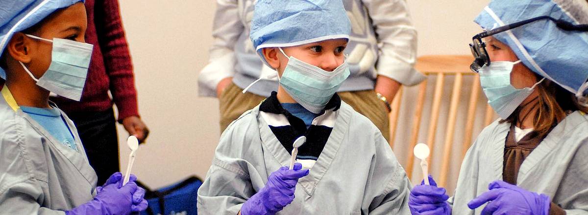 Children acting as dentists