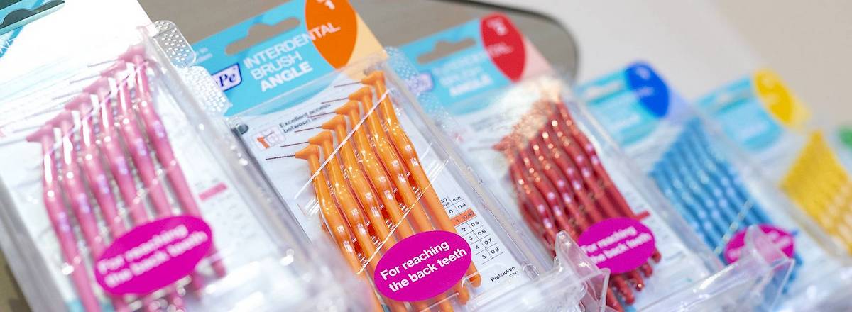 Dental cleaning products on shelf