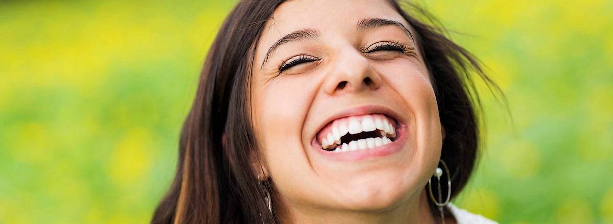 Young woman with fine white smile
