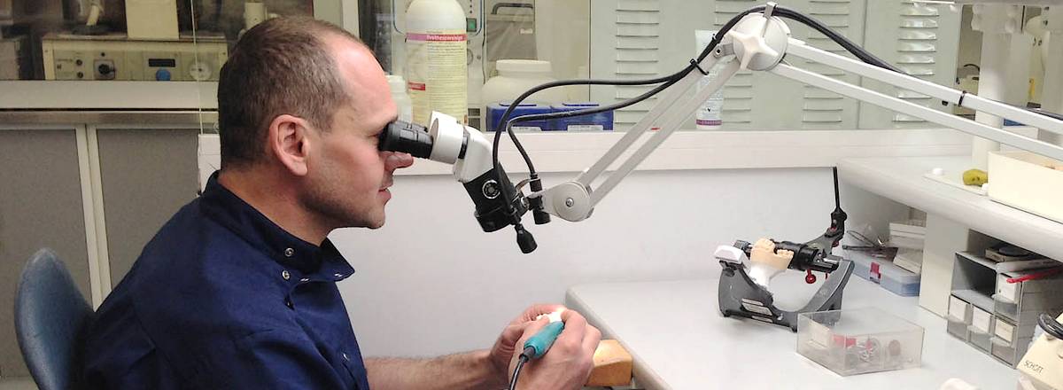 Dental technician Andrea Tropea in lab